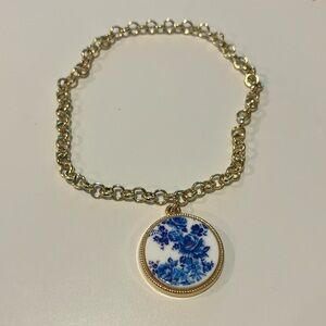 Elegant Gold Chain Bracelet with Blue Floral Pendant